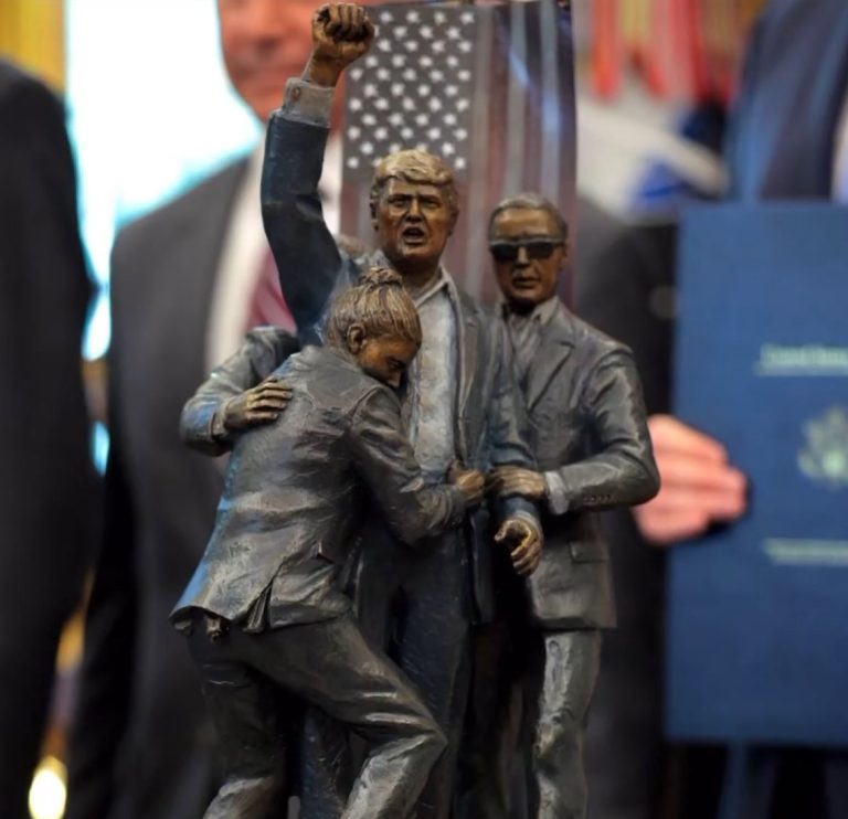 BREAKING: Trump Unveils Mini Statue in Oval Office, Commemorating Resilience Amidst Controversy in Butler, PA!