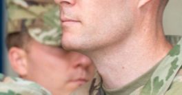 Trump's Controversial Pardon: Ex-Officer Defies COVID Rules, Demands Pay!  military pardon news, COVID mandate defiance, backpay for service members