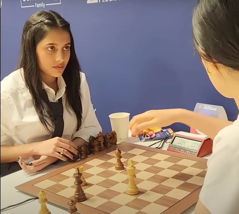 Divya Deshmukh Shocks World, Topples Chess Titan Hou Yifan! chess tournament success, rising female chess stars, World Team Blitz Championships highlights