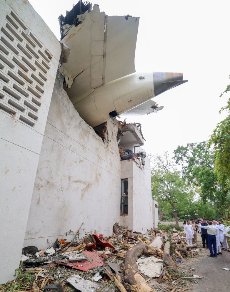 "Tragedy Strikes Ahmedabad: Lives Lost in Devastating Crash"  Ahmedabad disaster response, crash site recovery efforts, support for tragedy victims