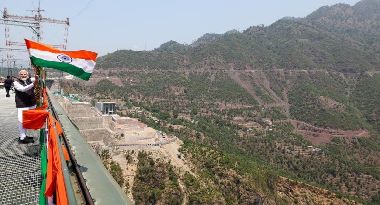 "Tricolour Soars: Is Chenab Bridge India's Boldest Infrastructure Triumph?" Chenab Rail Bridge construction, futuristic infrastructure development, India engineering achievements