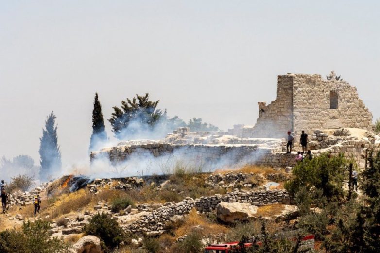 "Outrage as Israeli Settlers Torch Ancient Monastery in Taybeh!" Christian heritage preservation, West Bank cultural heritage, religious site protection
