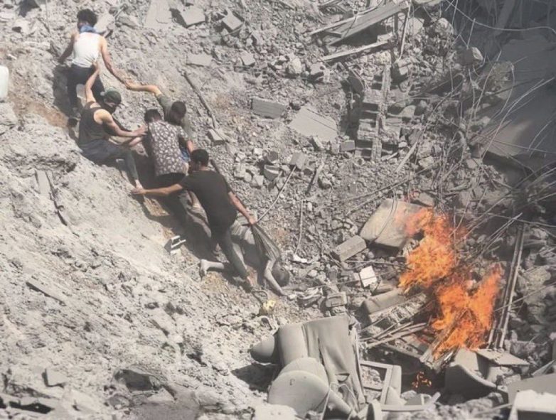 "Shocking Gaza Image Reveals Human Tragedy Amid Ongoing Conflict" Gaza conflict news, humanitarian crisis in Palestine, impact of war on families