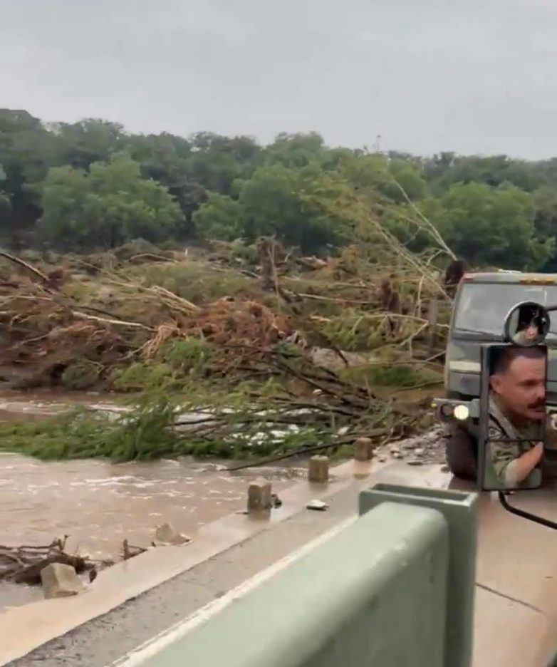 "Texas Flood Rescues: National Guard Saves Girls from Devastation!" rescue operations flood relief, Texas National Guard support, campground disaster recovery